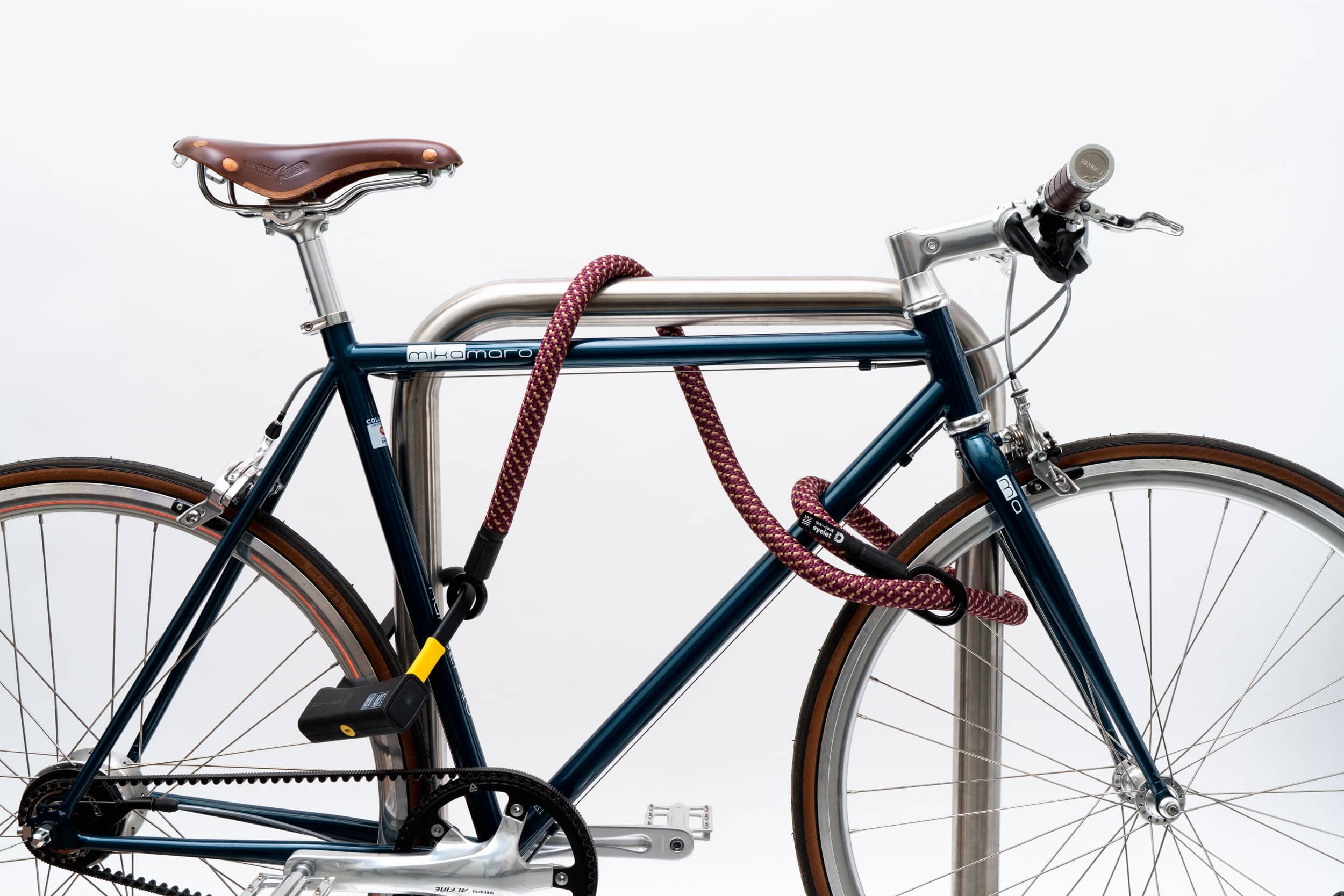 red-gold texlock eyelet Set textile lock secures several bike parts to the bike stand