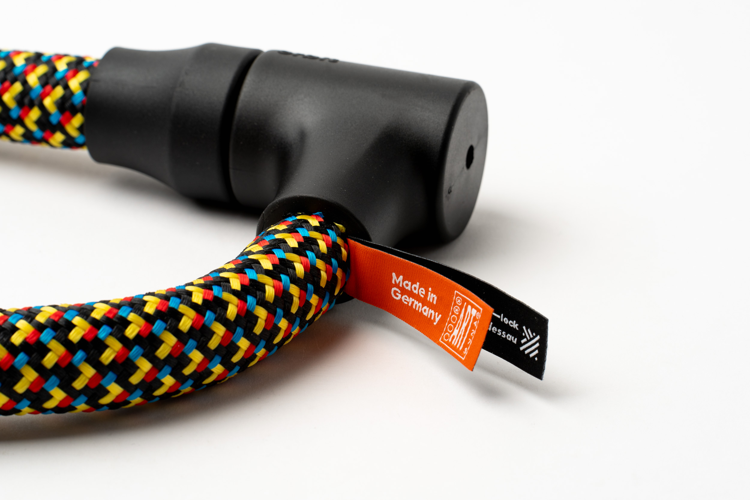 Kleurrijk texlock orbit textielslot met ART veiligheidscertificaat op geweven label