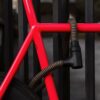 black-gold texlock orbit textile lock secures bicycle