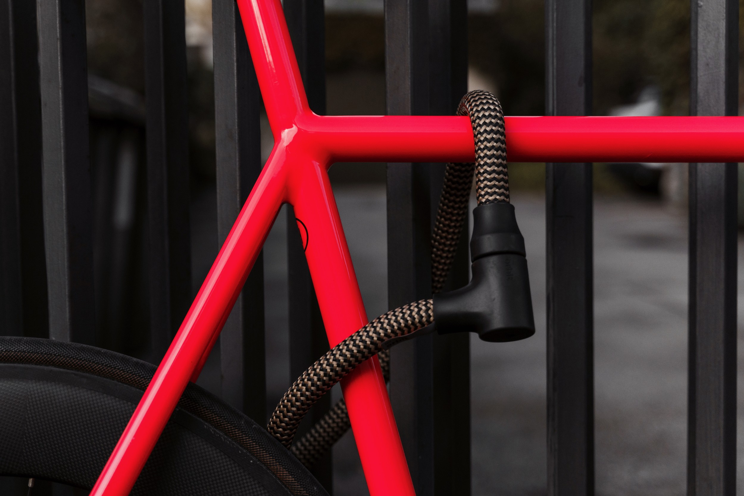 black-gold texlock orbit textile lock secures bicycle